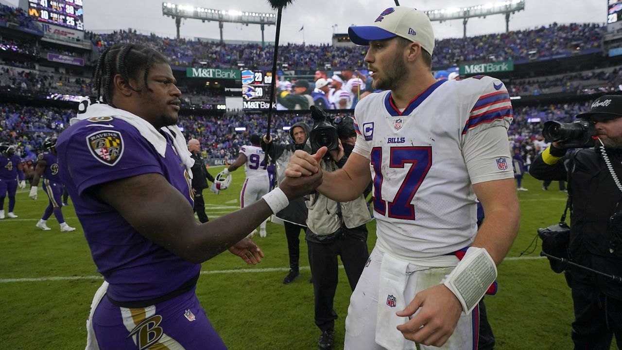 FILE - Baltimore Ravens quarterback Lamar Jackson, left, and Buffalo Bills quarterback Josh Allen (17) shake hands after an NFL football game Sunday, Oct. 2, 2022, in Baltimore. (AP Photo/Julio Cortez, File)