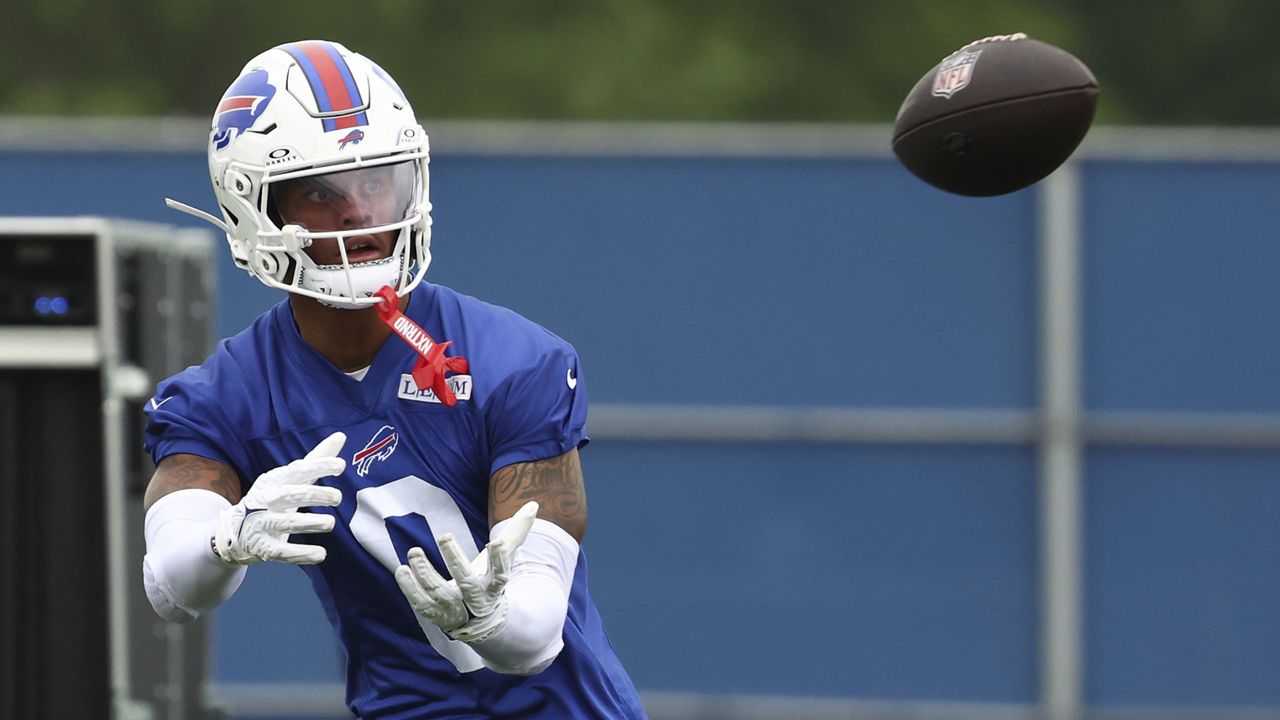 Buffalo Bills wide receiver Keon Coleman (0) watches the ball during NFL football practice in Orchard Park, N.Y., Tuesday, June 11, 2024. (AP Photo/Jeffrey T. Barnes)