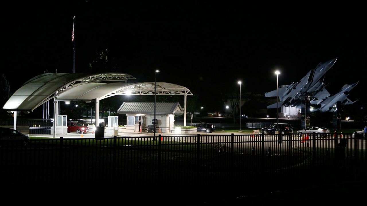 People wait in their cars inside the main gate of Wright-Patterson Air Force Base during a lockdown Friday, Sept. 10, 2021, in Dayton, Ohio. (AP Photo/Jay LaPrete)