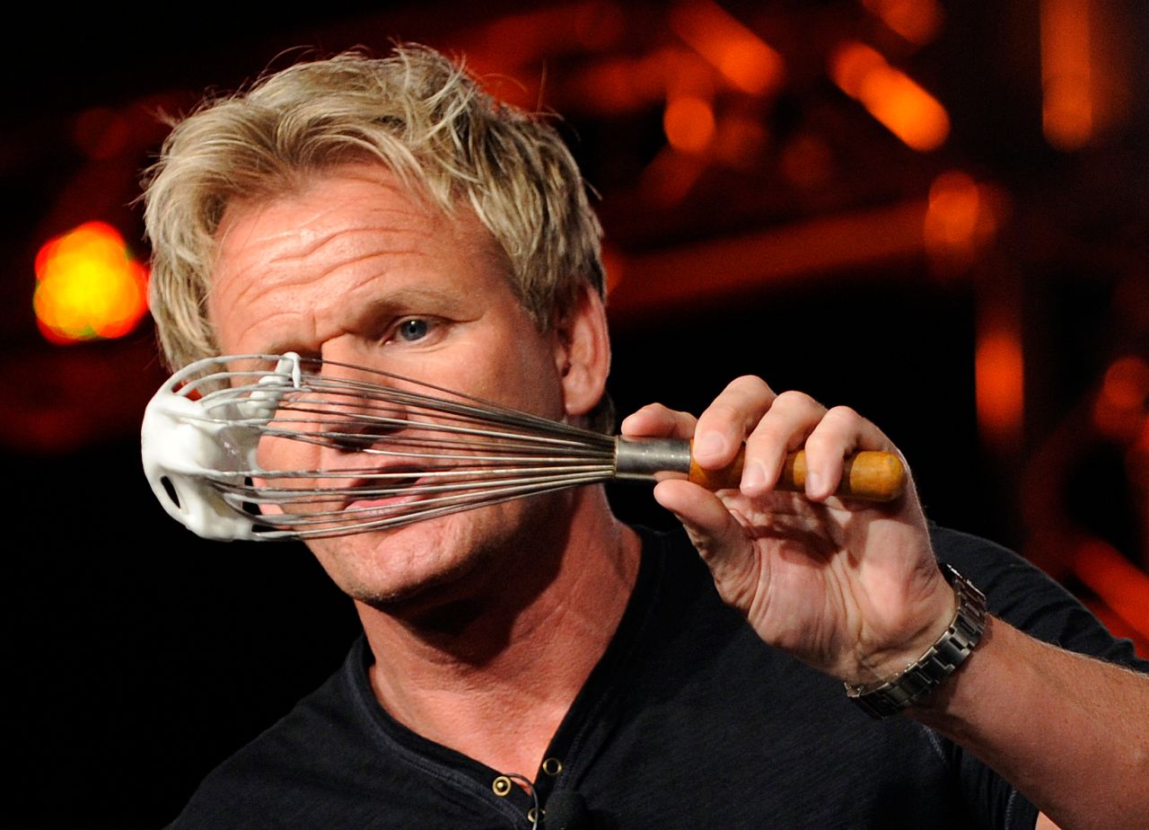 Gordon Ramsay, head chef on the shows "Cookalong Live," "Hell's Kitchen" and "Kitchen Nightmares," demonstrates to television critics how to make a Baked Alaska dessert at the FOX Television Critics Association summer press tour in Pasadena, Calif., Thursday, Aug. 6, 2009. (AP Photo/Chris Pizzello)