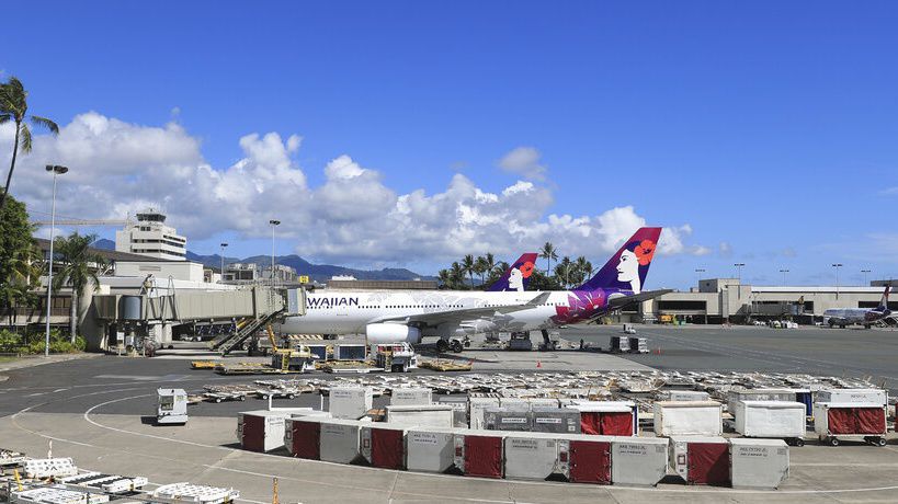 Parking rates will increase starting July 1, 2024, at Daniel K. Inouye International Airport. (AP Photo/Marco Garcia)