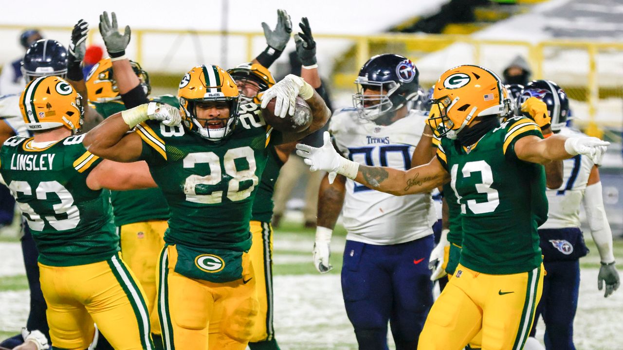 Green Bay Packers vs Tennessee Titans game photos at Lambeau Field