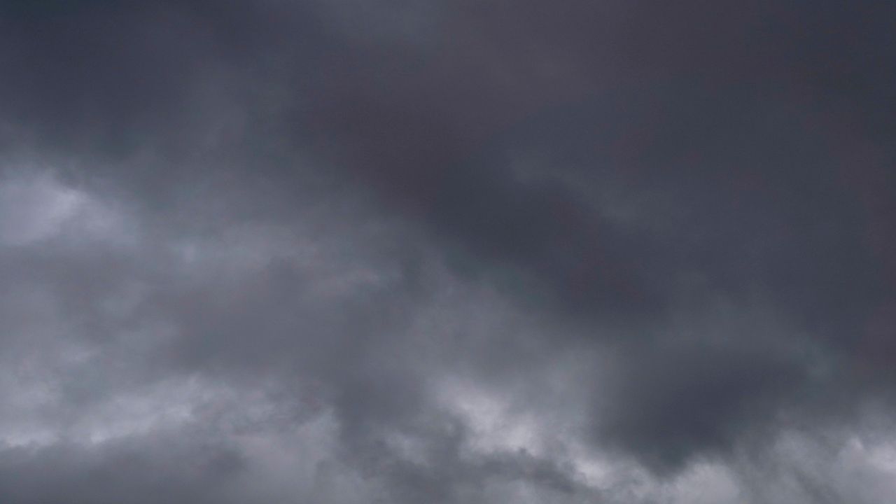 Storm clouds fill the sky. (Associated Press)