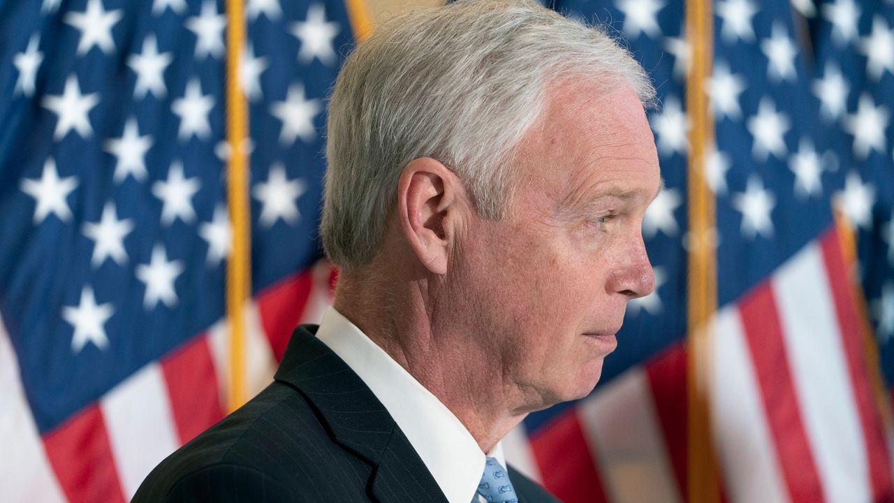 FILE - Sen. Ron Johnson, R-Wis., attends a news conference Feb., 2, 2022, on Capitol Hill in Washington.Sen. Johnson said he's not fighting to persuade Oshkosh Defense to locate 1,000 jobs in Wisconsin rather than South Carolina, providing an opening for his Democratic challengers to accuse the two-term incumbent of being out of touch with the needs of his state. Johnson told reporters at a news conference Saturday Feb. 5, 2022.