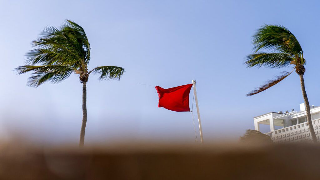 A red flag, signaling high surf and strong currents. (AP Photo/Andrew Harnik)