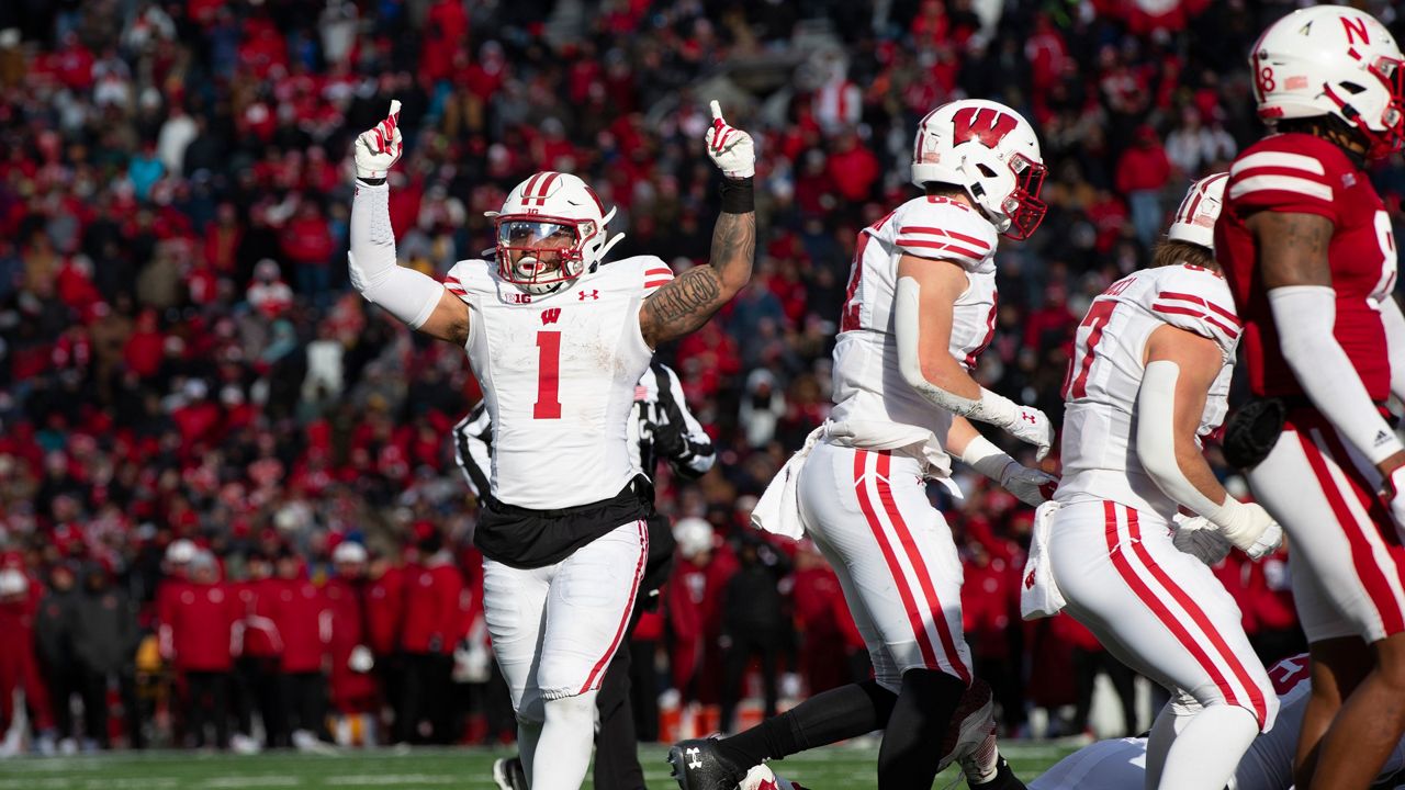 Wisconsin's Chez Mellusi (1) celebrates after teammate Graham Mertz scored a 1-yard touchdown against Nebraska to take the lead during the second half of an NCAA college football game, Saturday, Nov. 19, 2022, in Lincoln, Neb.