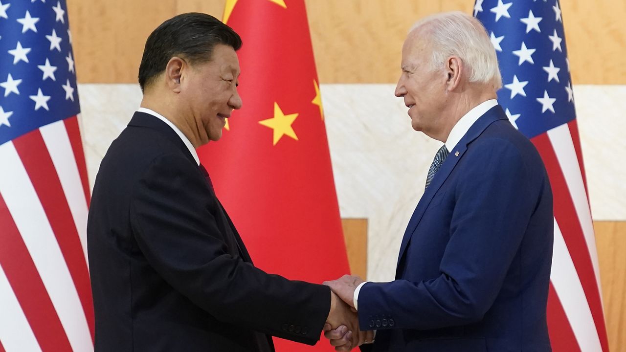 U.S. President Joe Biden, right, and Chinese President Xi Jinping shake hands before their meeting on the sidelines of the G20 summit meeting, Nov. 14, 2022, in Nusa Dua, in Bali, Indonesia. (AP Photo/Alex Brandon, File)