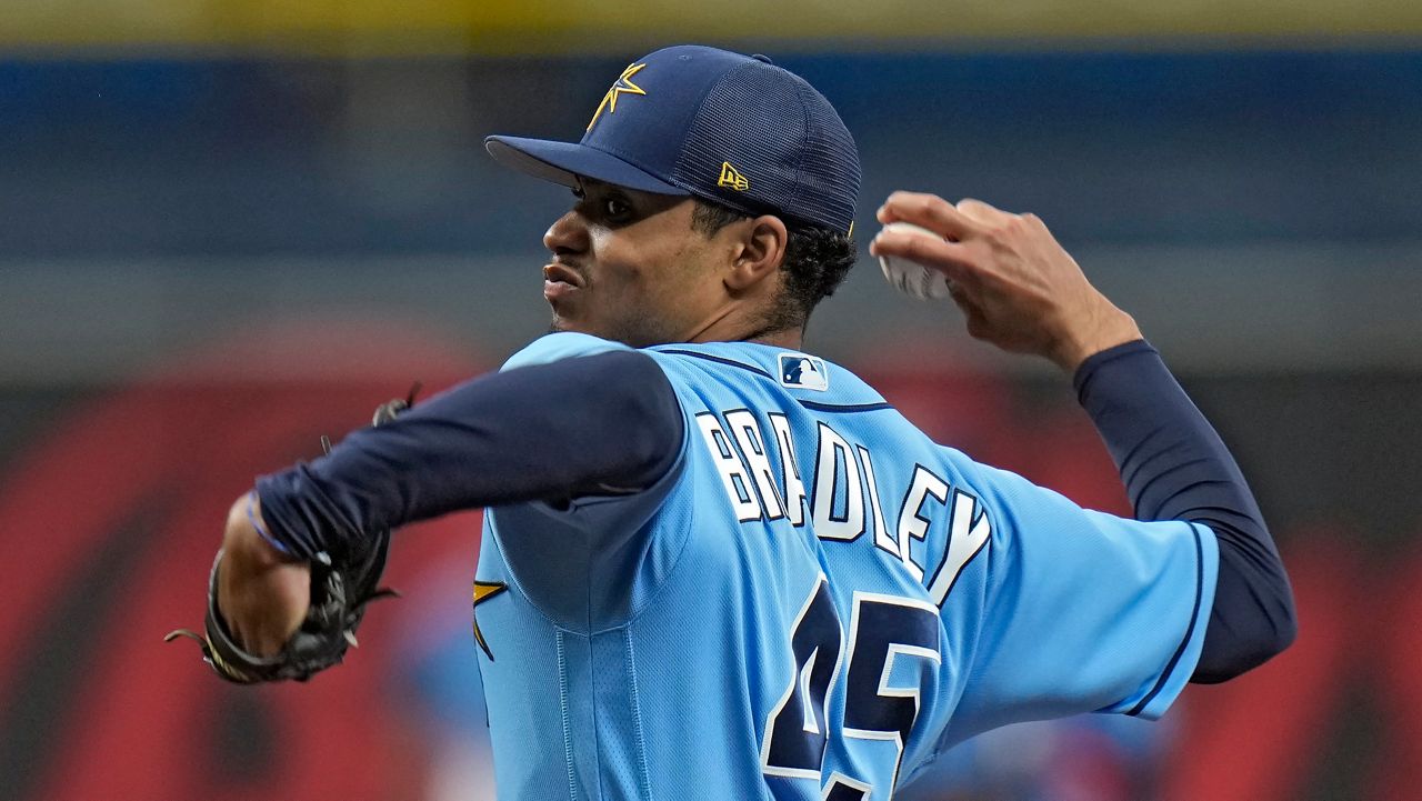 Tampa Bay Rays relief pitcher Taj Bradley delivers to the Atlanta Braves during the fifth inning of a spring training baseball game Friday, March 10, 2023, in St. Petersburg, Fla. (AP Photo/Chris O'Meara)