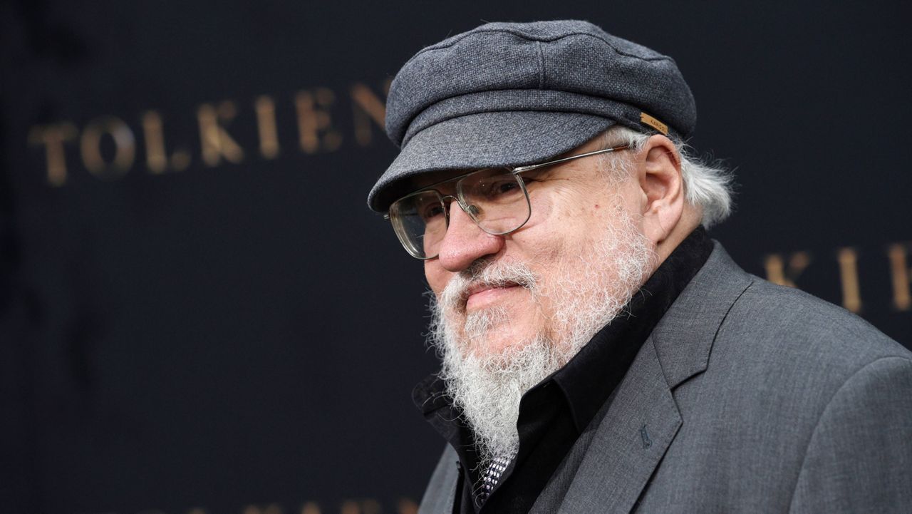 Author George R.R. Martin poses at the premiere of the film "Tolkien," at the Regency Village Theatre on May 8, 2019, in Los Angeles. Warner Bros. Discovery is sticking with safe bet franchises that will likely lure viewers, including a “Harry Potter” series and a “Game of Thrones” prequel for its rebranded Max streaming service, the company announced Wednesday, April 12, 2023. (Photo by Chris Pizzello/Invision/AP)