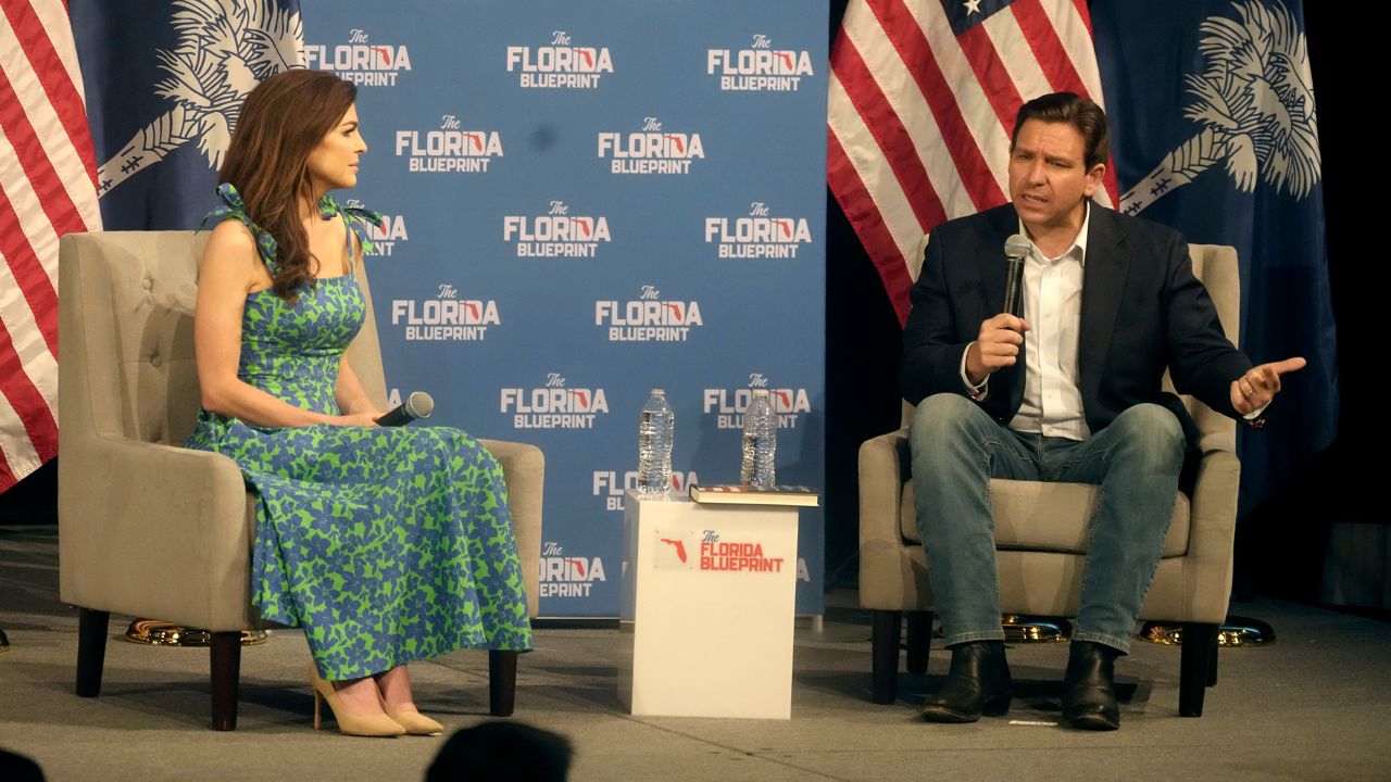 FILE — Casey DeSantis, left, looks on as her husband, Gov. Ron DeSantis, R-Fla., speaks to a crowd at First Baptist North on Wednesday, April 19, 2023, in Spartanburg, S.C. (AP Photo/Meg Kinnard)