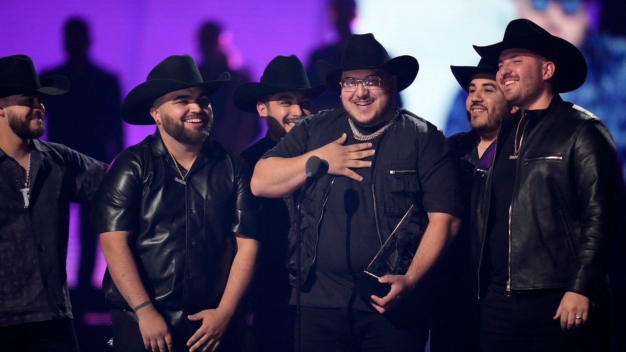 Grupo Frontera accepts the award for best regional mexican song for "No se va (En vivo)" at the Latin American Music Awards on Thursday, April 20, 2023, at the MGM Grand Garden Arena in Las Vegas. (AP Photo/John Locher)