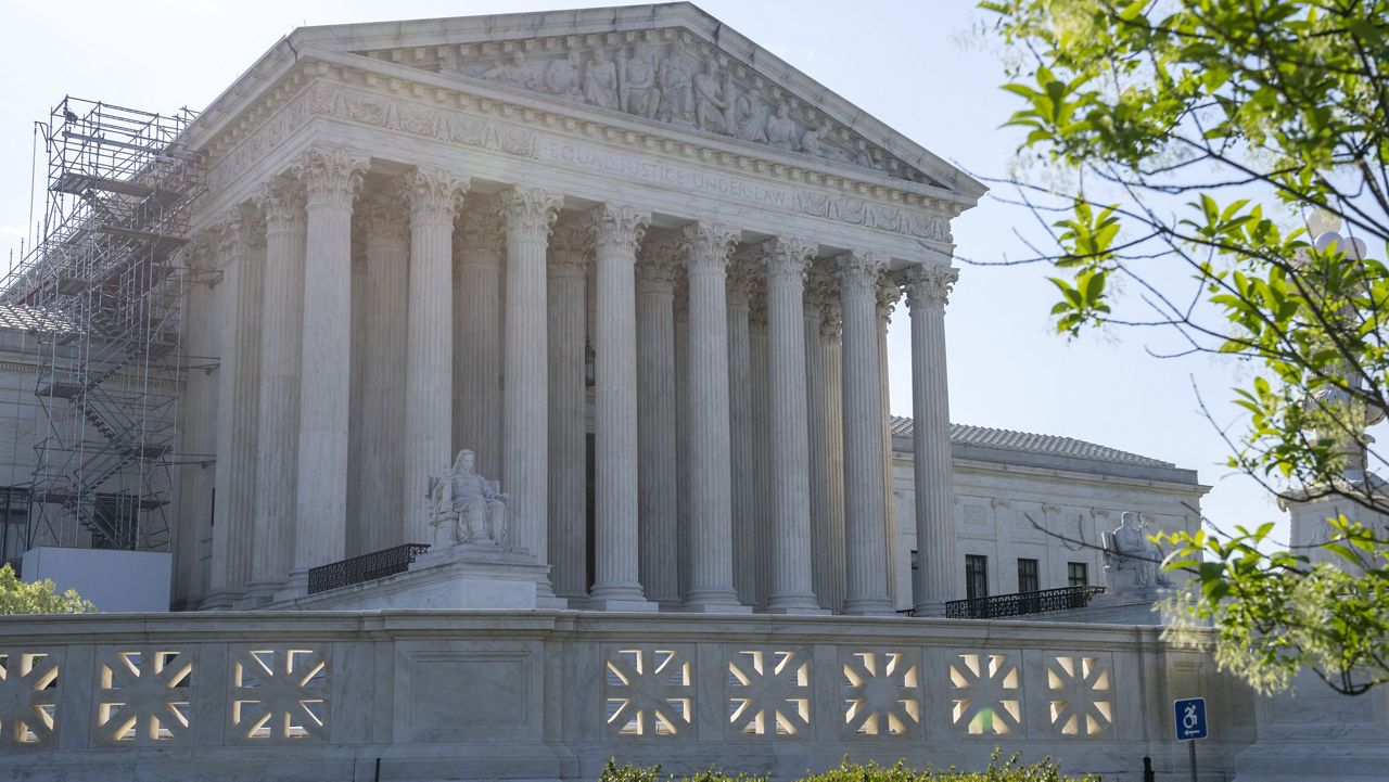 The Supreme Court is seen, Friday, April 21, 2023, ahead of an abortion pill decision in Washington. (AP Photo/Jacquelyn Martin)