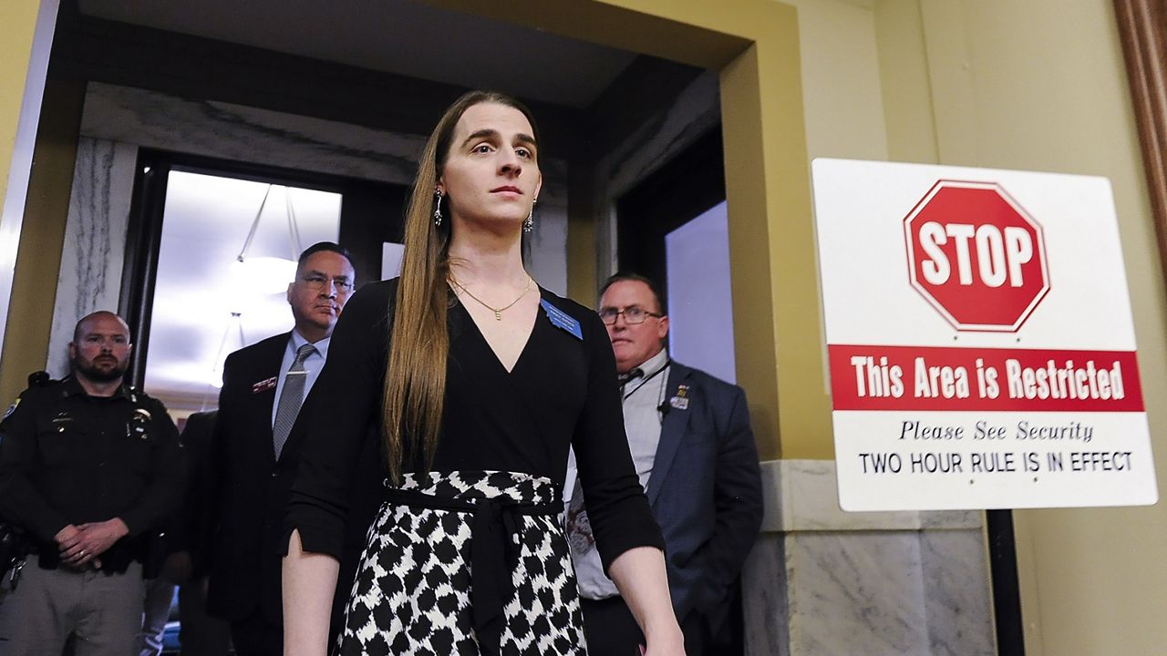 Rep. Zooey Zephyr, D-Missoula, walks out of the Montana House of Representatives after lawmakers voted to ban her from the chamber on Wednesday, April 26, 2023, in the State Capitol in Helena, Montana. (Thom Bridge/Independent Record via AP)