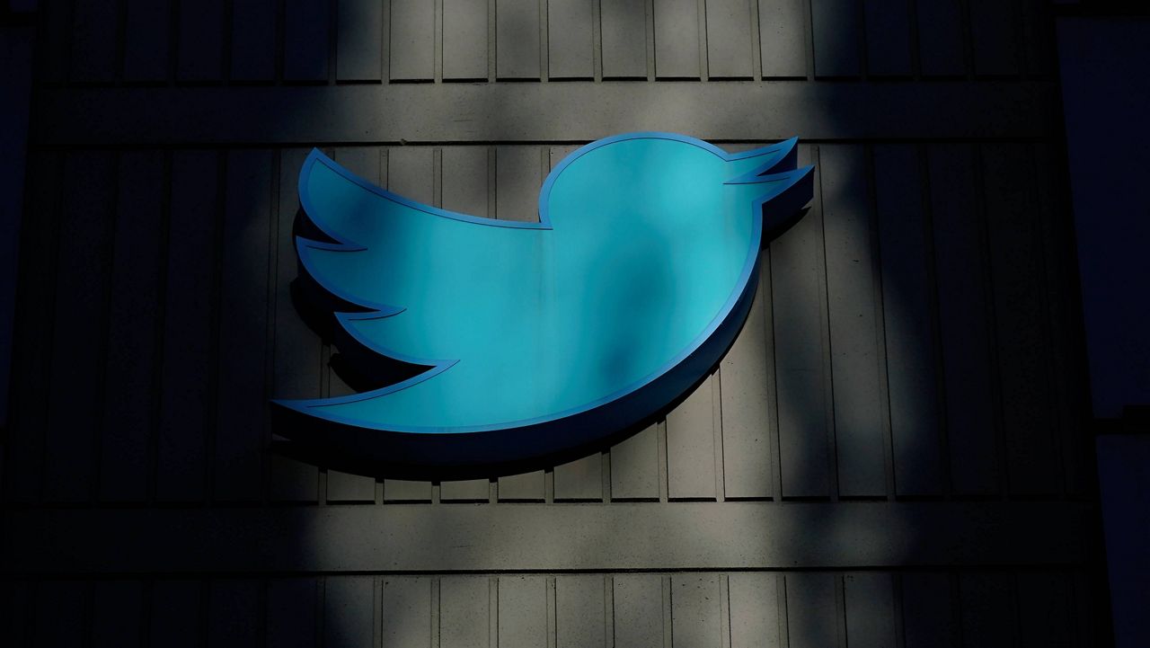 A sign at Twitter headquarters is shown in San Francisco, Friday, Nov. 18, 2022. Election falsehoods are thriving on Twitter after former President Donald Trump dug in on these claims at a CNN town hall, despite Twitter owner Elon Musk's insistence that false stolen-election claims on the platform “will be corrected.” An analysis shows the 10 most widely shared tweets promoting a “rigged election” narrative in the five days after the town hall have not been labeled or removed. (AP Photo/Jeff Chiu)