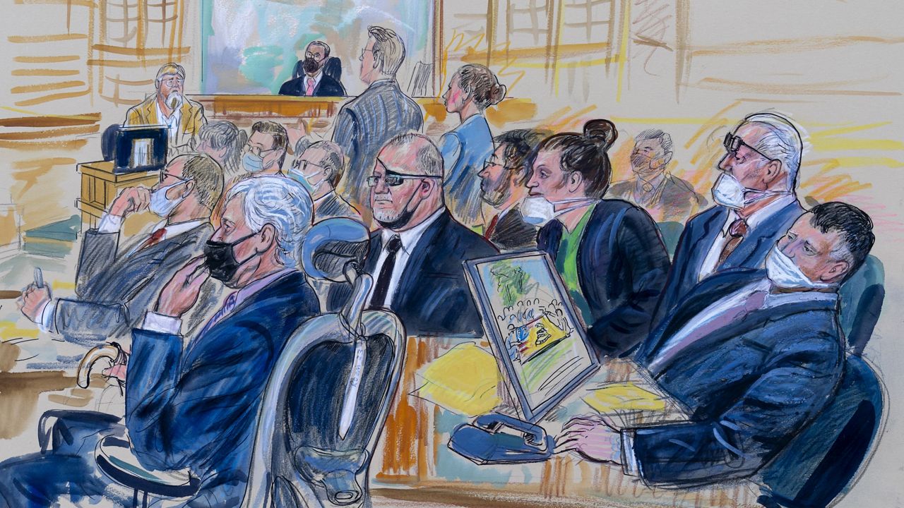 This artist sketch depicts the trial of Oath Keepers leader Stewart Rhodes and four others charged with seditious conspiracy in the Jan. 6, 2021, Capitol attack, in Washington, Oct. 6, 2022. Defendant Jessica Watkins, of Woodstock, Ohio, is seated third from right. (Dana Verkouteren via AP)