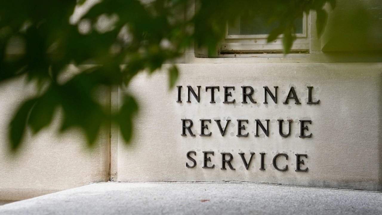A sign is displayed outside the Internal Revenue Service building on May 4, 2021, in Washington. (AP Photo/Patrick Semansky)