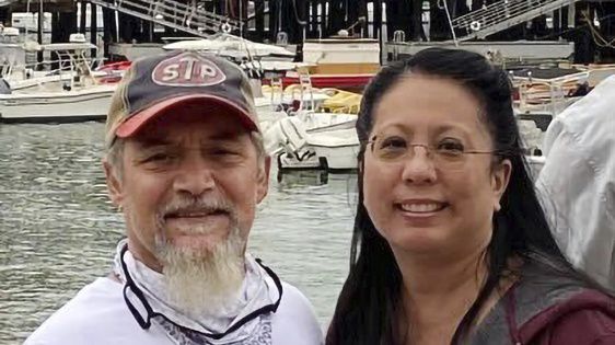 This undated photo provided by James Solis shows Robert Solis, left and his partner Brandi Tyau, right. Robert Solis and Tyau were aboard the charter fishing vessel Awakin when it ran into trouble Sunday in rough seas off the coast of southeast Alaska. The bodies of three of the five people aboard have been found but two people remain missing. Authorities are working to salvage the boat, which was found partially submerged off an island near Sitka, Alaska. Those on the vessel were Solis and Tyau, Tyau's sister and her partner and the boat captain. (James Solis via AP)