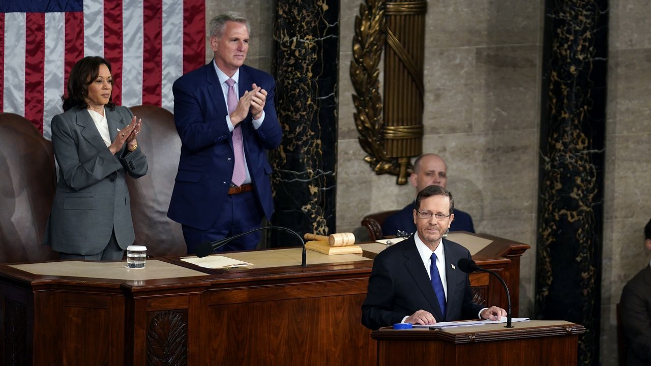 Israeli President Isaac Herzog speaks to a joint session of Congress, Wednesday, July 19, 2023, at the Capitol in Washington, as Vice President Kamala Harris and House Speaker Kevin McCarthy of Calif., look on.(AP Photo/Stephanie Scarbrough)