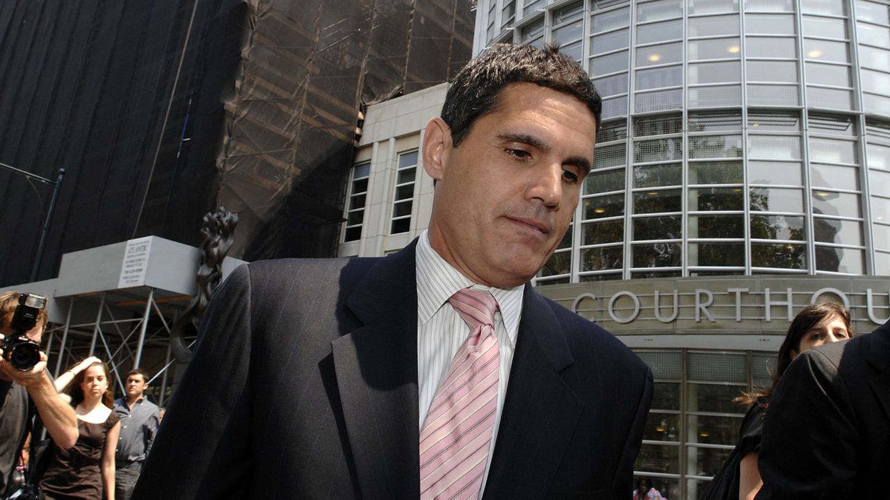 Attorney John Lauro exits Brooklyn federal court following a news conference on Aug. 15, 2007. (AP Photo/ Louis Lanzano, File)