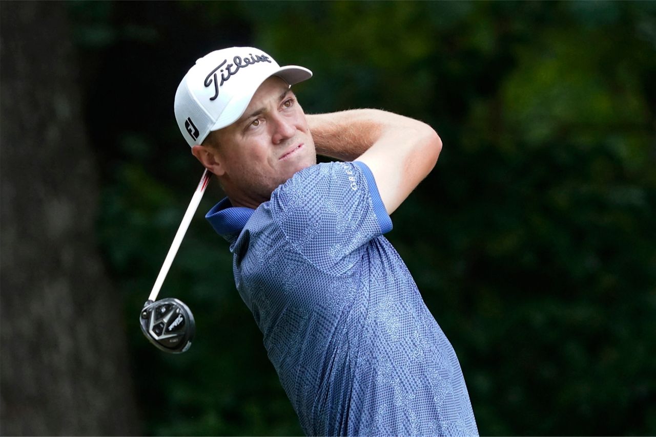 Justin Thomas watches his tee shot on the second hole during the second round of the Wyndham Championship golf tournament in Greensboro, N.C., Friday, Aug. 4, 2023. (AP Photo/Chuck Burton)