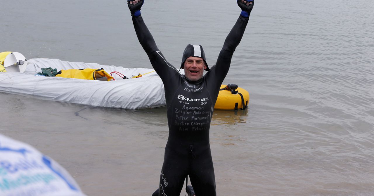 Marathon swimmer ends his quest to cross Lake Michigan after two days