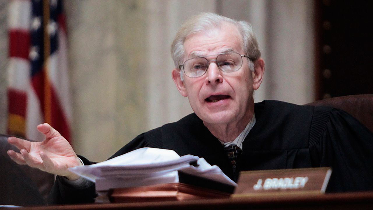 Wisconsin Supreme Court Justice David Prosser posing a question during a hearing at the state Capitol in Madison, Wis., June 6, 2011. Former Justice Prosser, tapped to investigate impeaching newly elected Justice Janet Protasiewicz for taking Democratic Party money, accepted donations from the state Republican Party when he was on the court. (John Hart/Wisconsin State Journal via AP, Pool, file)