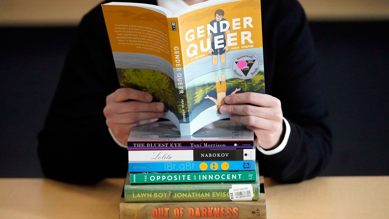 A woman reading the book 