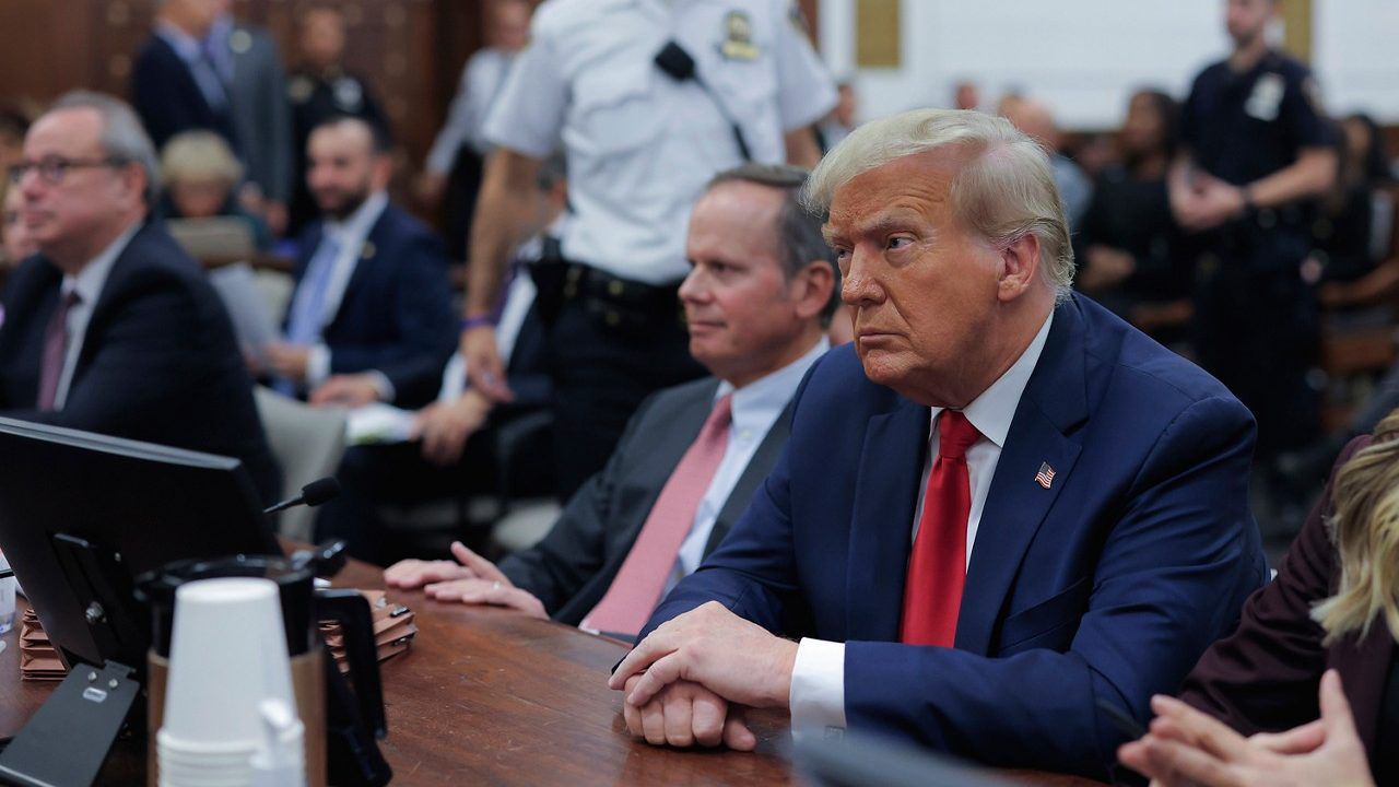 Former President Donald Trump sits in the courtroom with his legal team before the continuation of his civil business fraud trial at New York Supreme Court, Tuesday, Oct. 17, 2023, in New York. (Andrew Kelly/Pool Photo via AP)