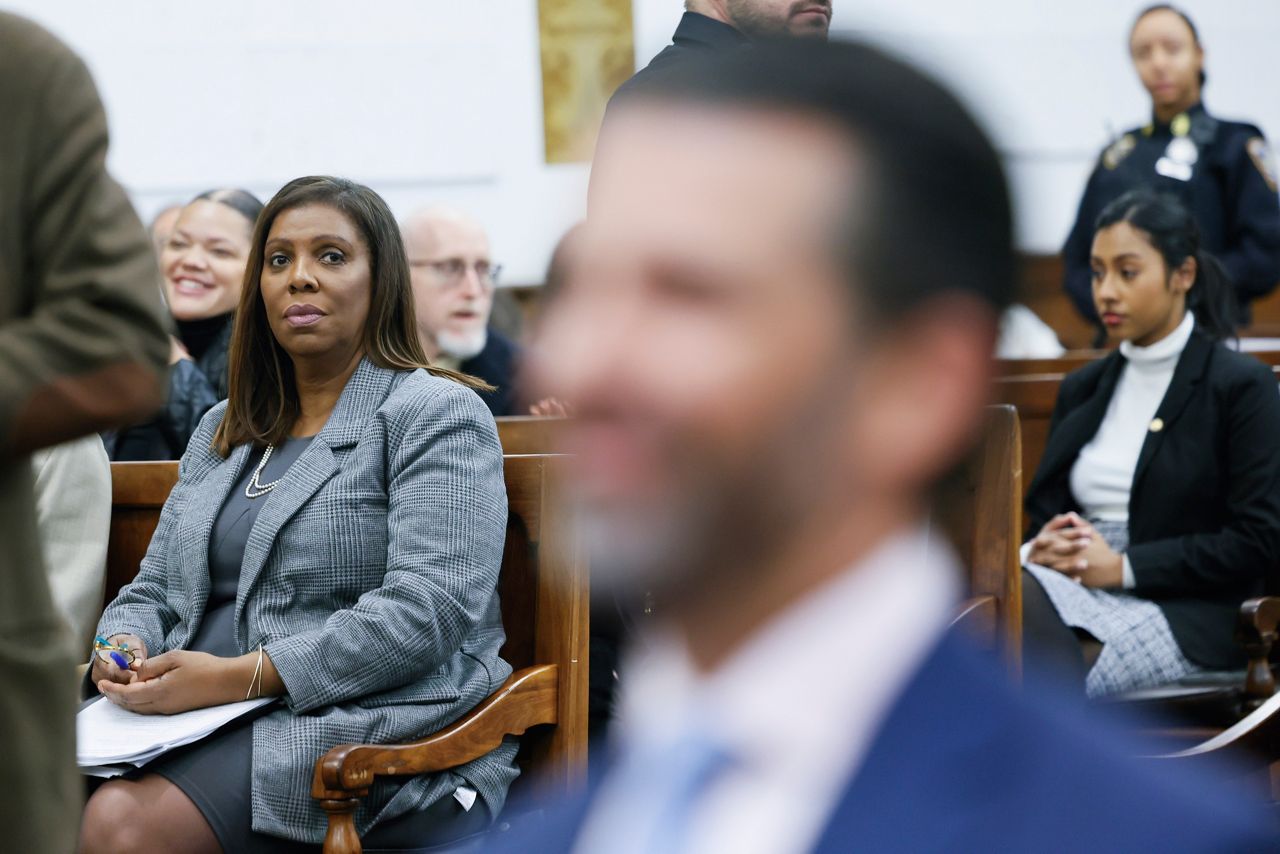 New York Attorney General Letitia James looks at Donald Trump, Jr., right, at the fraud trial for his father, former President Donald Trump, at New York Supreme Court, Thursday, Nov. 2, 2023, in New York. (Michael M Santiago/Pool Photo via AP)