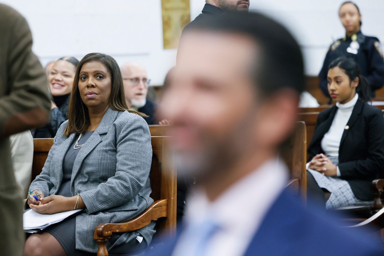New York Attorney General Letitia James looks at Donald Trump, Jr., right, at the fraud trial for his father, former President Donald Trump, at New York Supreme Court, Thursday, Nov. 2, 2023, in New York. (Michael M Santiago/Pool Photo via AP)