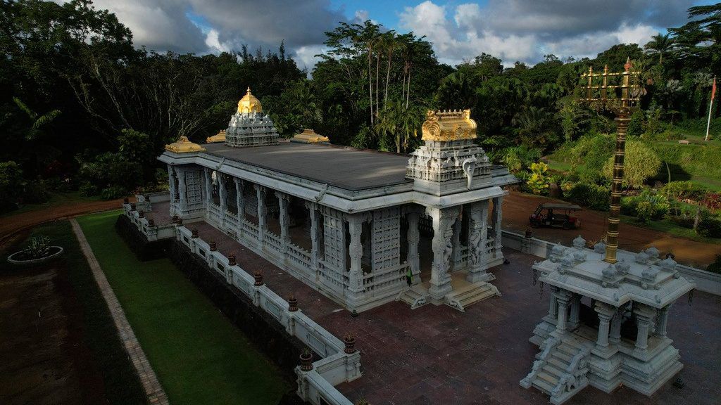 The sun shines down on the golden spires of the Iraivan Temple at Kauai's Hindu Monastery, on July 10, 2023, in Kapaa, Hawaii. (AP Photo/Jessie Wardarski)