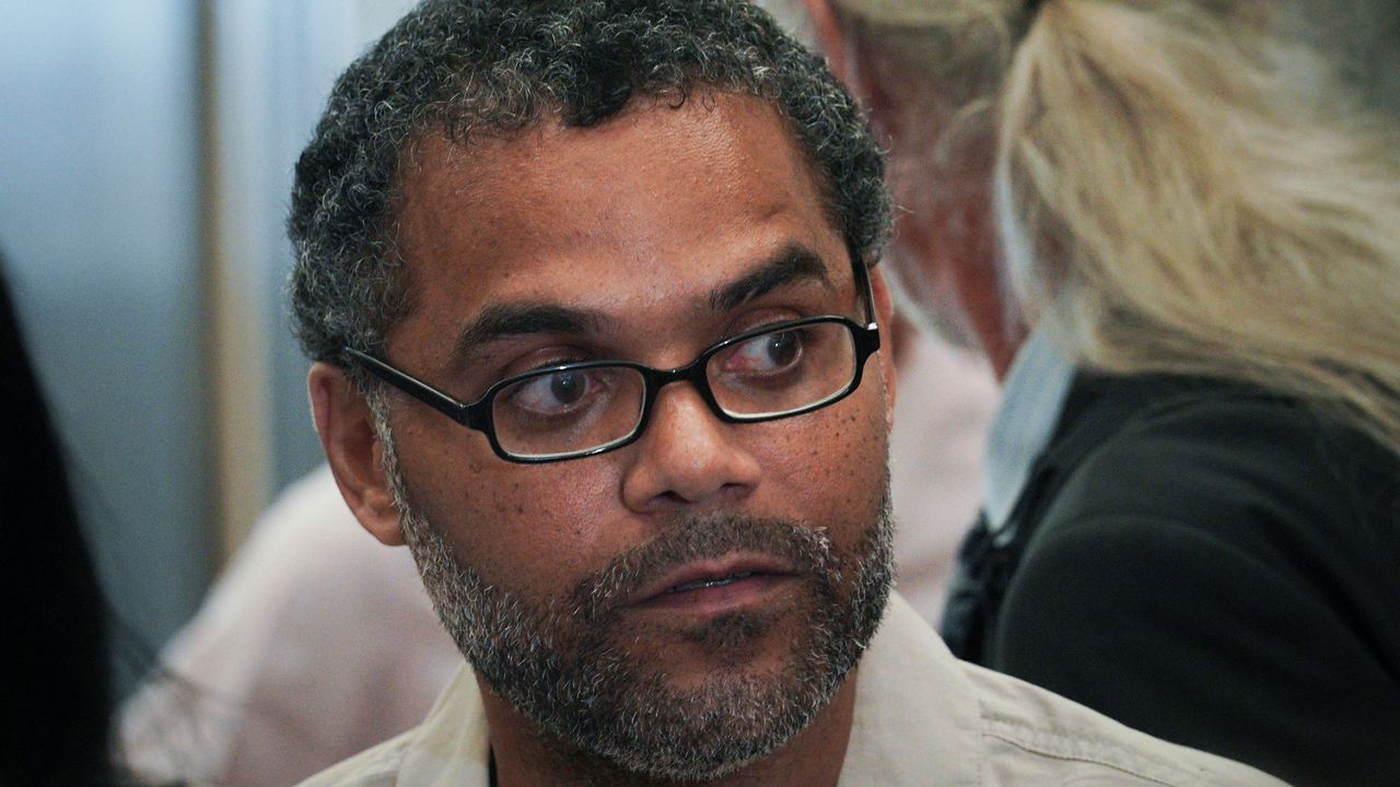 Thomas Malik listens while talking with press at Brooklyn Supreme Cour on July 15, 2022.