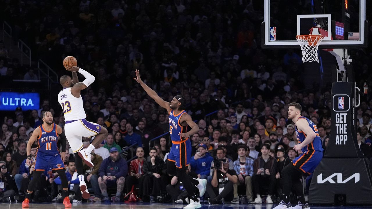 Los Angeles Lakers' LeBron James (23) shoots over New York Knicks' Precious Achiuwa (5) during the second half of an NBA basketball game Saturday, Feb. 3, 2024, in New York. The Lakers won 113-105.(AP Photo/Frank Franklin II)