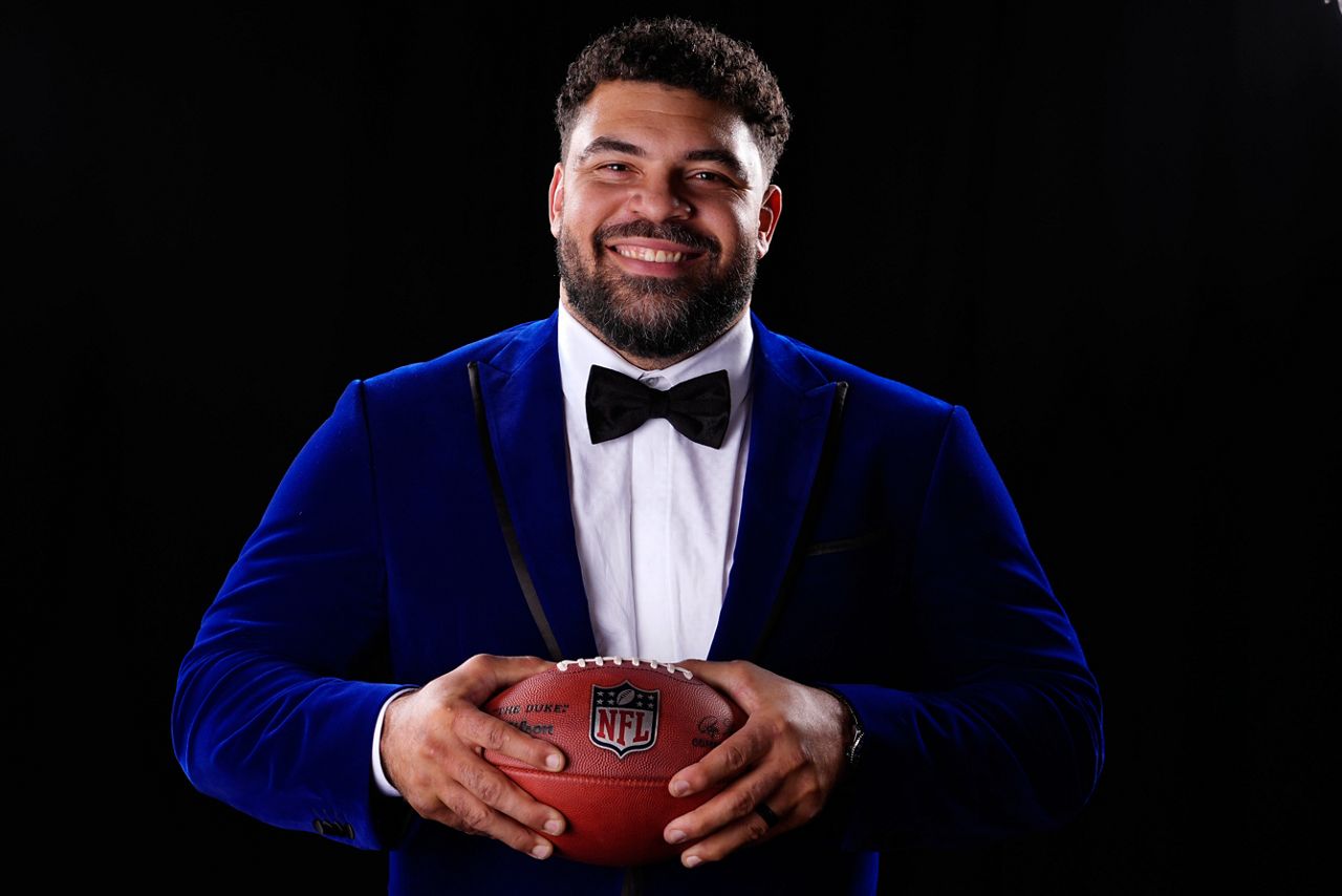 Walter Payton Man of the Year Award winner Cameron Heyward of the Pittsburgh Steelers poses after winning the award at the NFL Honors award show ahead of the Super Bowl 58 football game Thursday, Feb. 8, 2024, in Las Vegas. (AP Photo/Matt York)