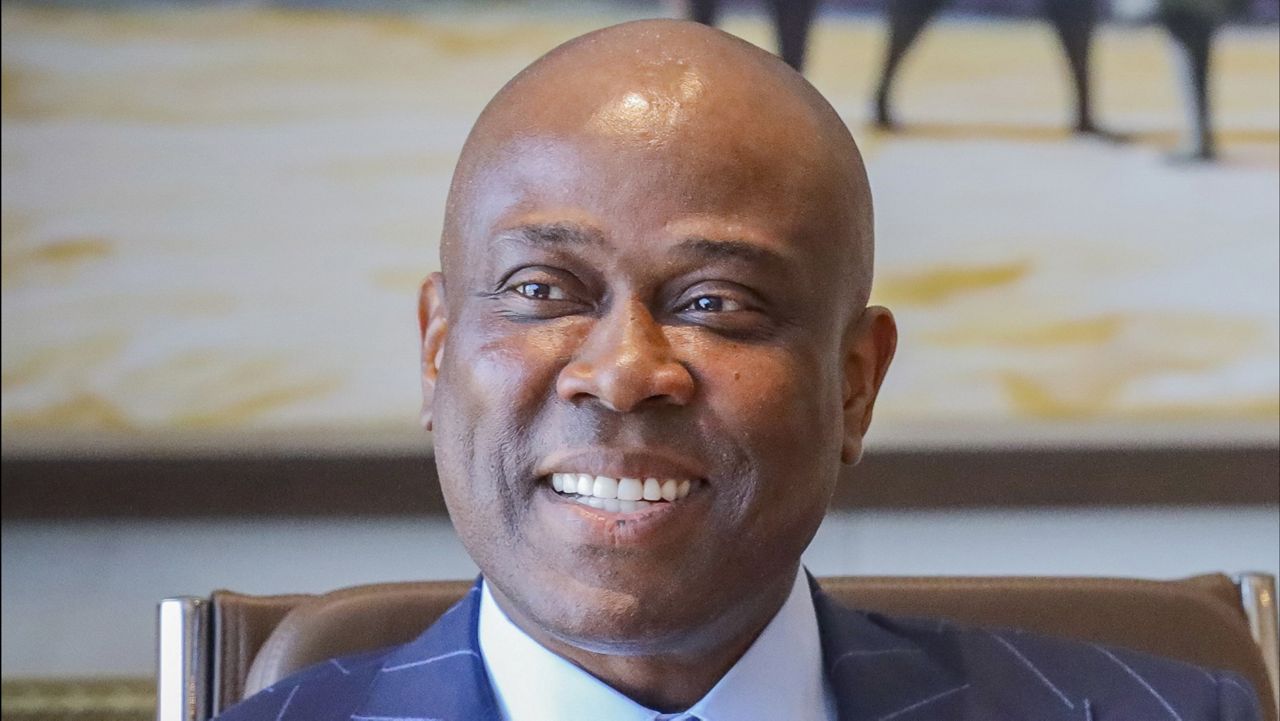 This undated photograph shows Herbert Wigwe, chief executive of Access Bank, Nigeria in his Lagos office. (AP Photo/Ayodeji Owolabi)