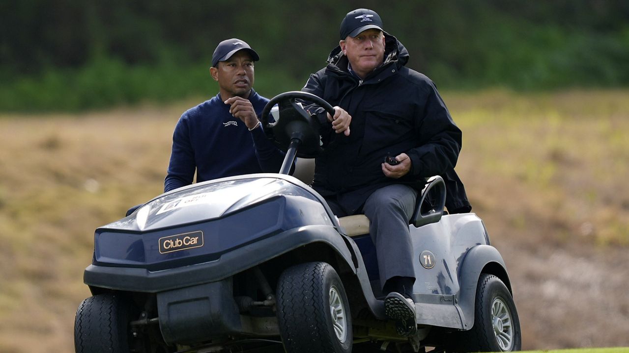 Tiger Woods is driven off the course after withdrawing during the second round of the Genesis Invitational golf tournament at Riviera Country Club Friday, Feb. 16, 2024, in the Pacific Palisades area of Los Angeles. (AP Photo/Ryan Sun)