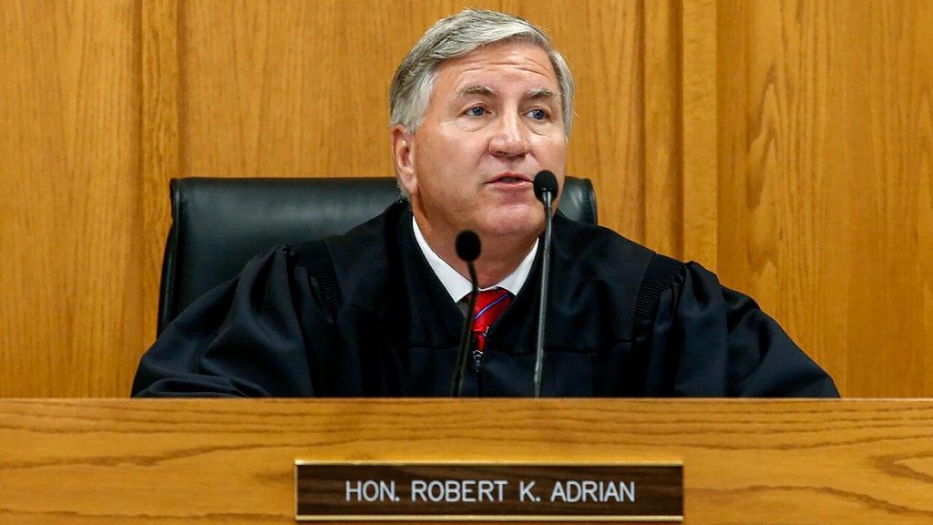 Judge Robert Adrian presides over court on Aug. 26, 2020, in Adams County, Ill. The Illinois Courts Commission removed  Adrian from the bench Friday, Feb. 24, 2024, after sustaining a complaint filed against him.  (Jake Shane/Quincy Herald-Whig via AP, File)