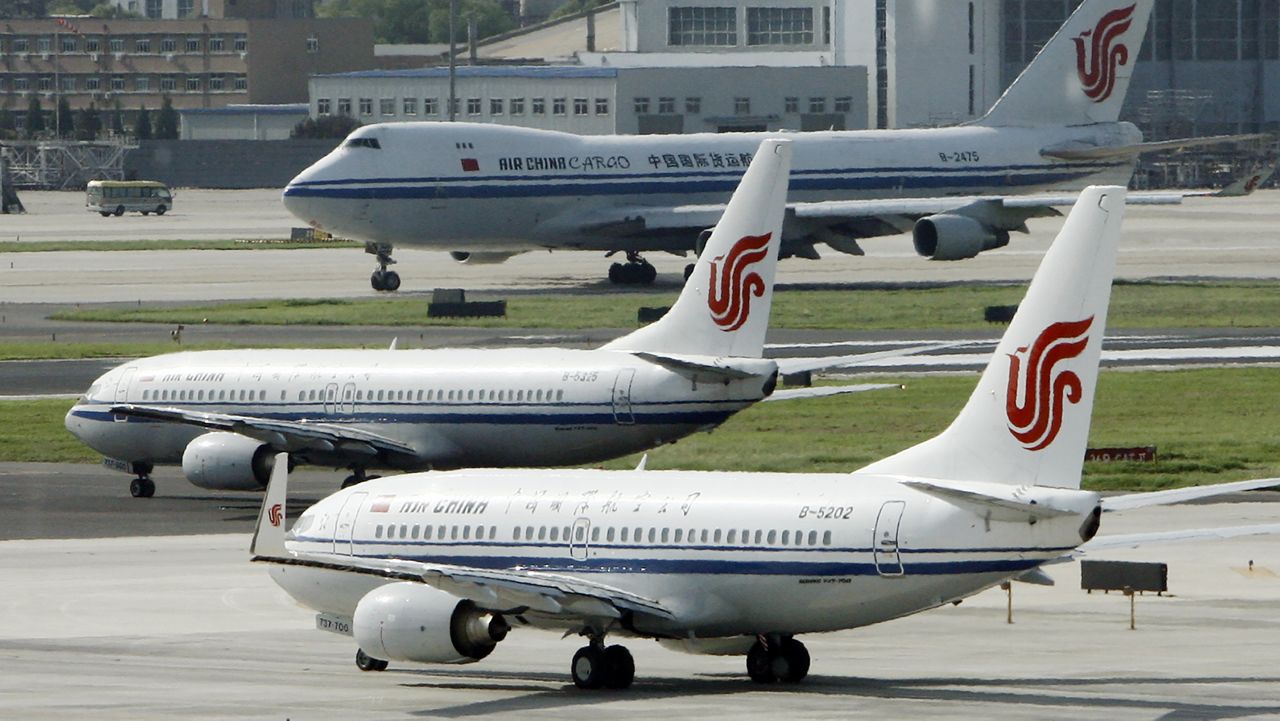 Air China planes sit on the tarmac at Beijing Airport in Beijing, China on Aug. 20, 2009. (AP Photo/Greg Baker, File)