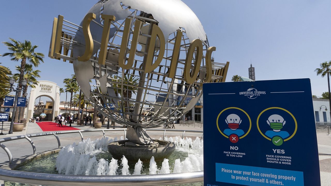 The Universal Studios Hollywood officially reopens to the public at 25% capacity with COVID-19 protocols in place in Los Angeles, on April 16, 2021. A tram accident at Universal Studios in Los Angeles injured multiple people Saturday night, April 20, 2024, authorities and the company said. (AP Photo/Damian Dovarganes, File)