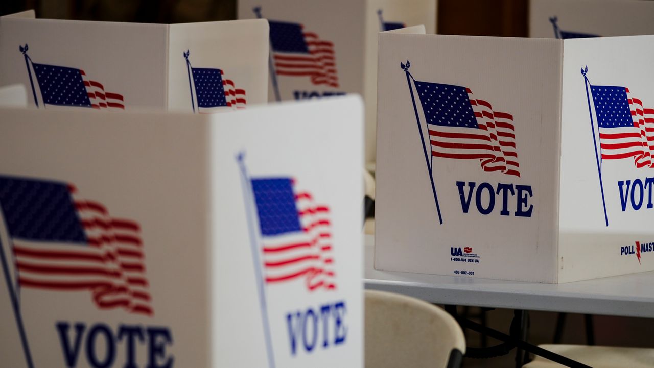 Voting booths are set up at a polling place in Newtown, Pa., Tuesday, April 23, 2024. (AP Photo/Matt Rourke)