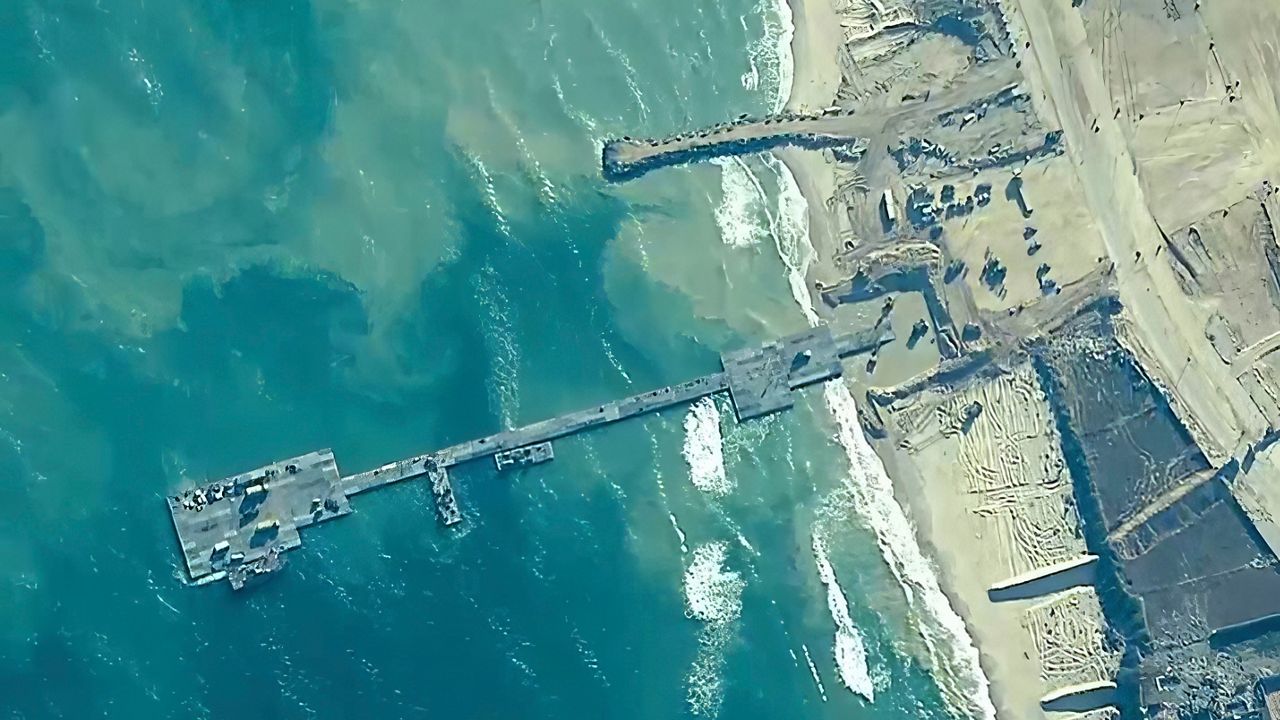 U.S. military forces and Israel Defense Forces place the Trident Pier on the coast of Gaza Strip on Thursday, May 16, 2024. (U.S. Central Command via AP)