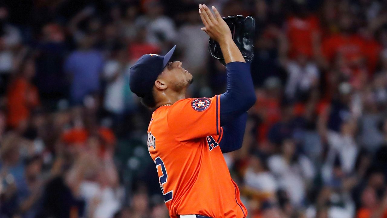 Houston Astros closing pitcher Bryan Abreu celebrates after the team's 14-11 win over the Baltimore Orioles in a baseball game Friday, June 21, 2024, in Houston. (AP Photo/Michael Wyke)
