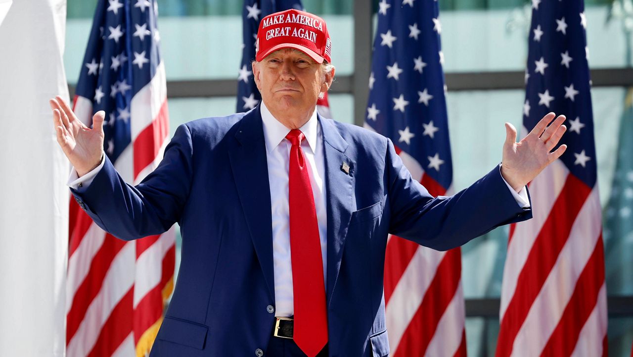 Republican presidential candidate former President Donald Trump enters at a campaign event, June 18, 2024, in Racine, Wis. (AP Photo/Jeffrey Phelps, File)