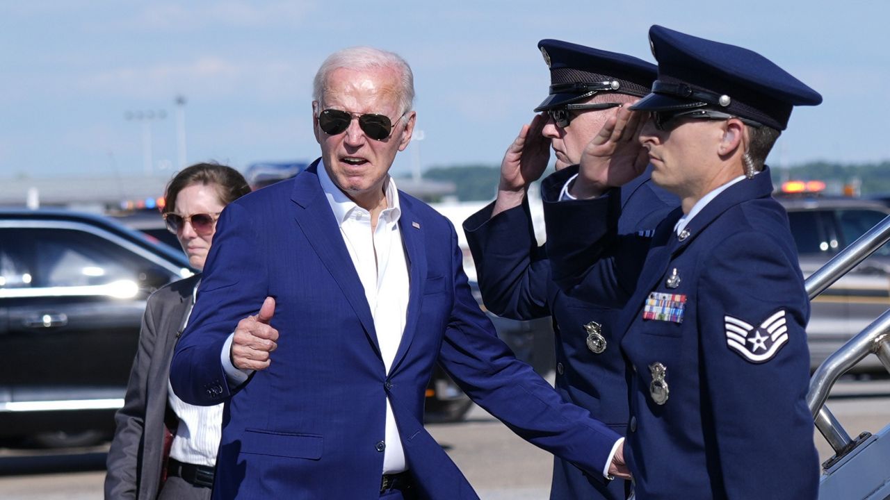 President Joe Biden gestures as he arrives at Harrisburg International Airport after attending a campaign rally, in Harrisburg, Pa., on Sunday, July 7, 2024. (AP Photo/Manuel Balce Ceneta)