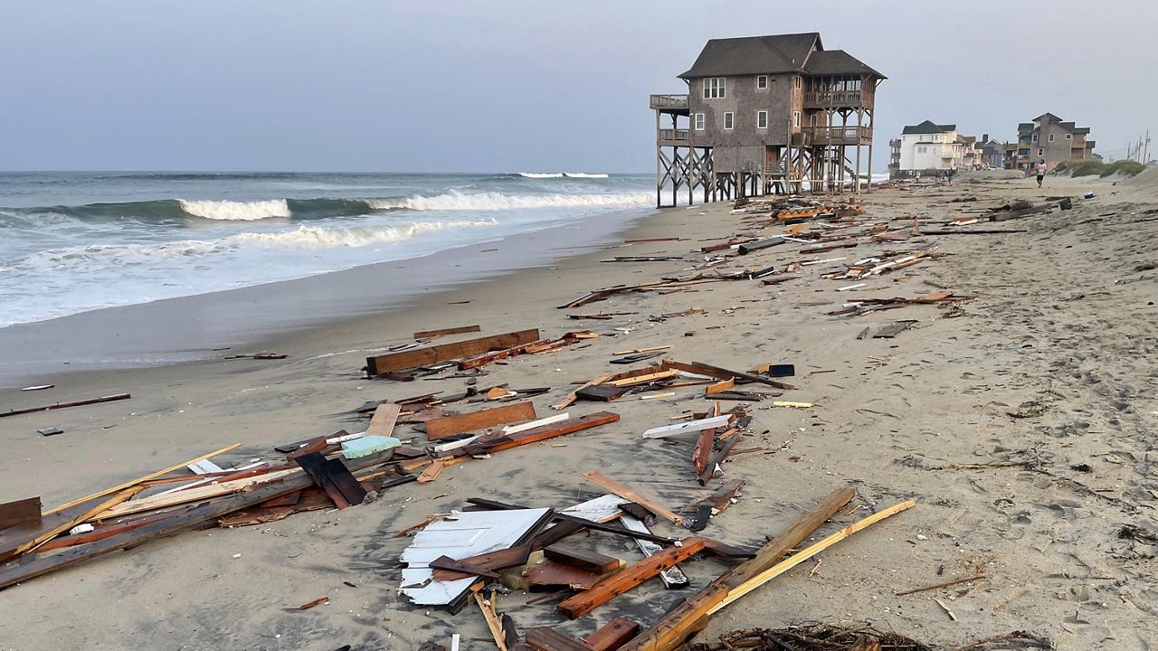 This photo provided by the National Park Service on Friday, Aug. 16, 2024, in Rodanthe, N.C., along the Cape Hatteras National Seashore shows debris from an unoccupied beach house that collapsed into the Atlantic Ocean from winds and waves caused by Hurricane Ernesto. (Cape Hatteras National Seashore via AP)