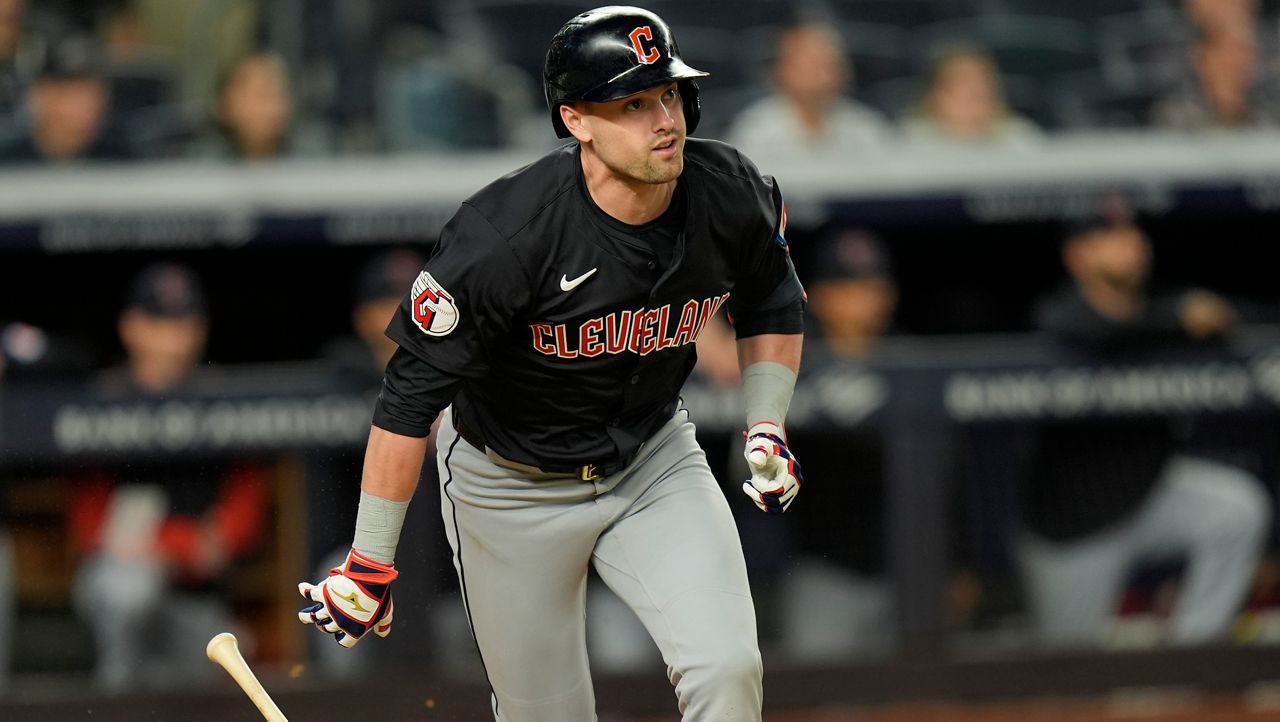 Cleveland Guardians' Lane Thomas looks after and RBI double during the 12th inning of a baseball game against the New York Yankees at Yankee Stadium Tuesday, Aug. 20, 2024, in New York. (AP Photo/Seth Wenig)