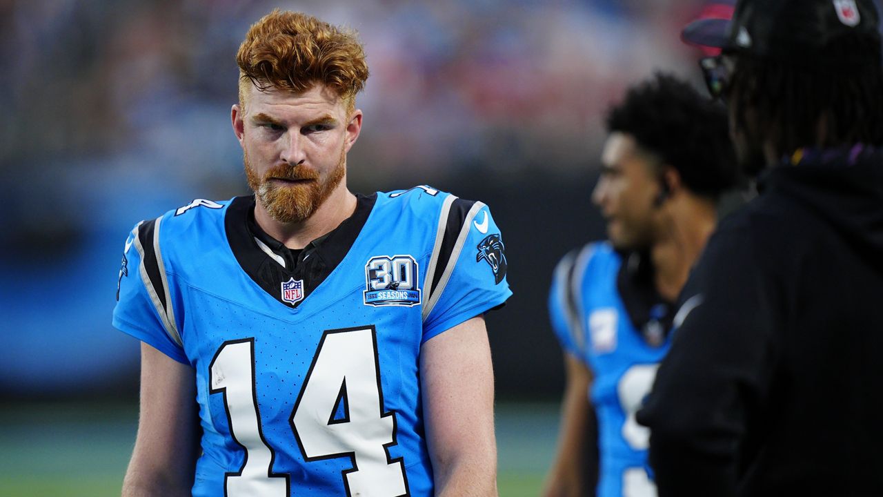 Carolina Panthers quarterback Andy Dalton (14) walks the sideline in the second half of an NFL football game against the in Charlotte, N.C., Sunday, Oct. 13, 2024. (AP Photo/Jacob Kupferman)