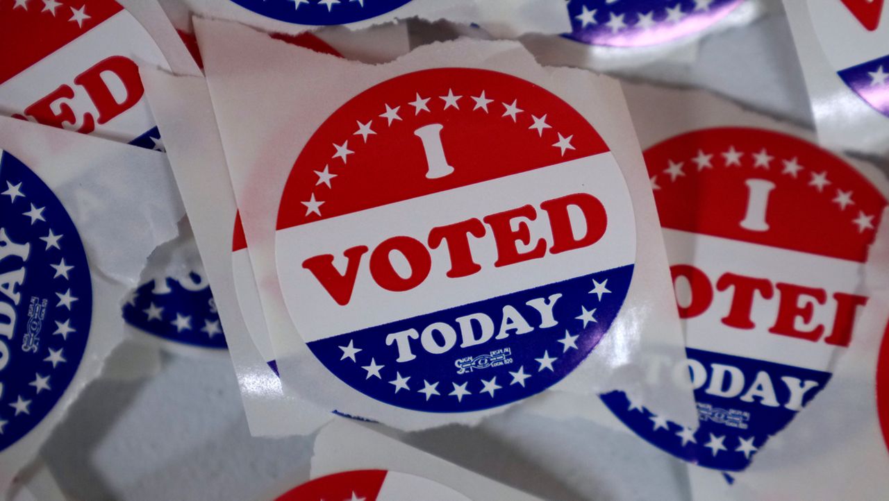 "I voted" stickers are seen in an Election Office during early voting, Wednesday, Oct. 16, 2024. (AP Photo/Charlie Neibergall)