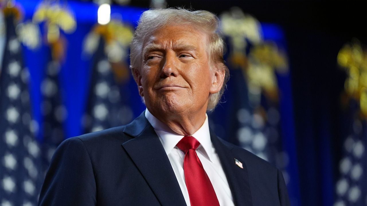 Republican presidential nominee former President Donald Trump arrives at an election night watch party at the Palm Beach Convention Center, Wednesday, Nov. 6, 2024, in West Palm Beach, Fla. (AP Photo/Evan Vucci)