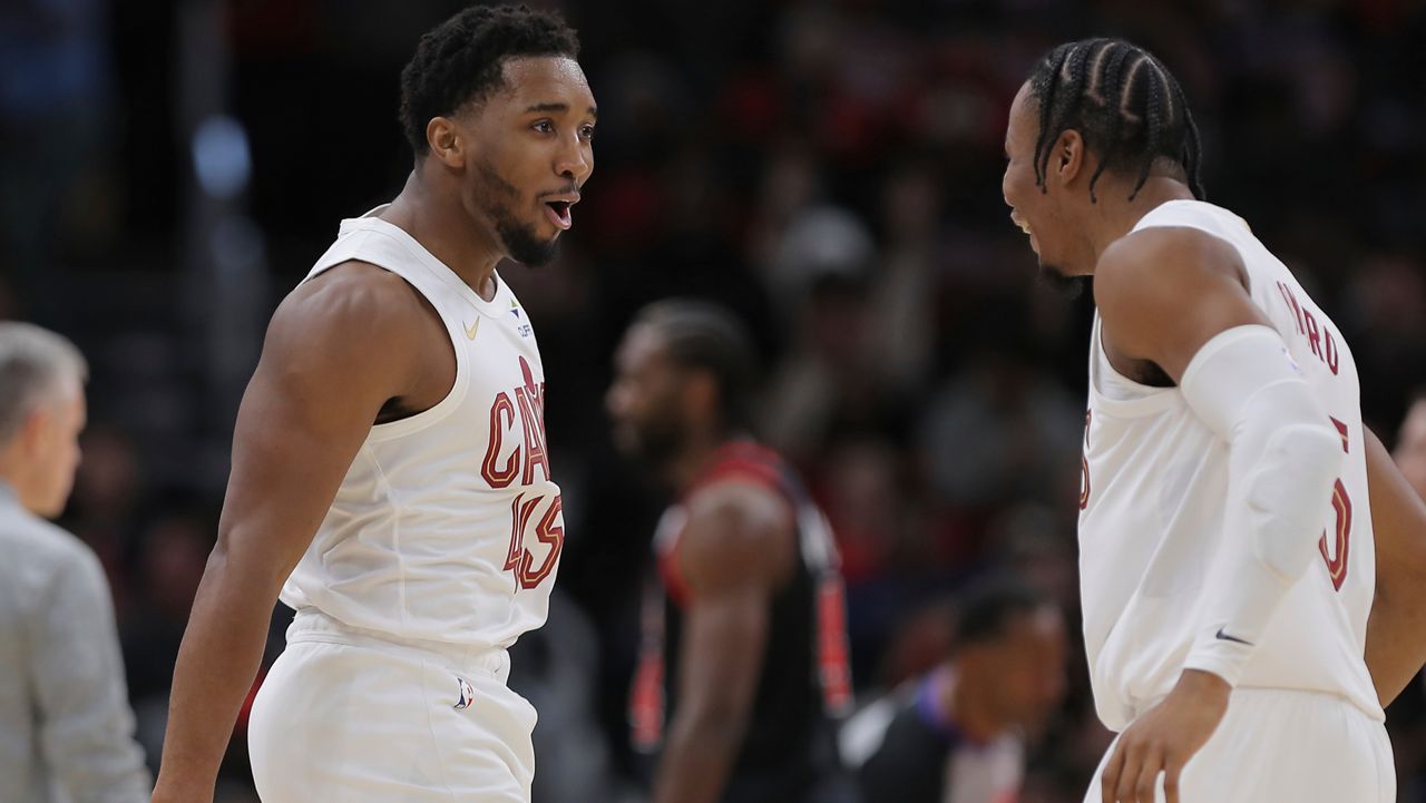 New Orleans Pelicans forward Brandon Ingram (14) leaps for a rebound over Cleveland Cavaliers forward Isaac Okoro (35) in the first half of an NBA basketball game in New Orleans, Wednesday, Nov. 6, 2024. (AP Photo/Gerald Herbert)